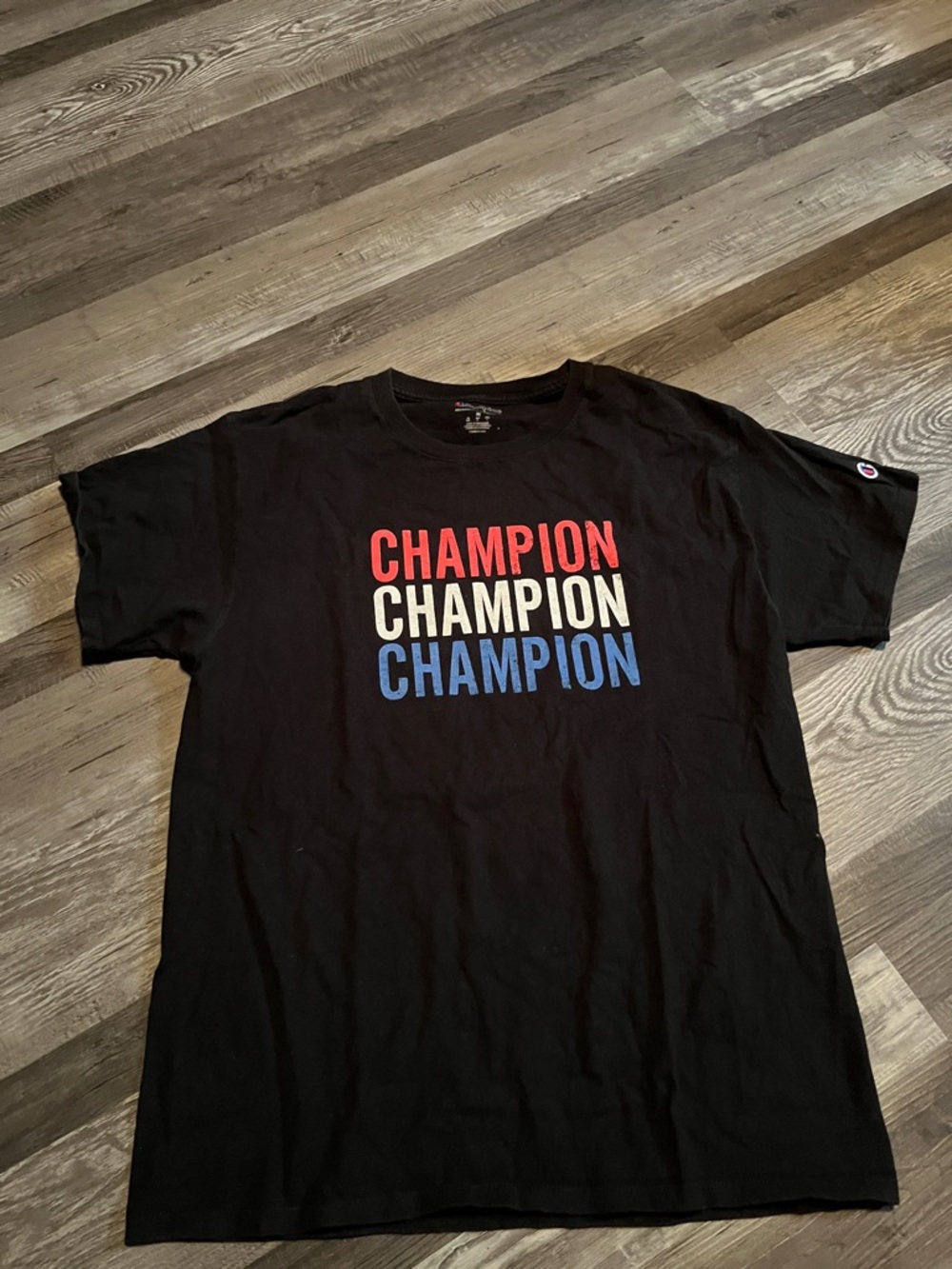 Champion Black Short Sleeve Tee with Red, White, and Blue Logo